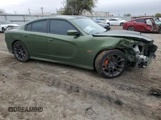 2021 Dodge Charger Scat Pack with VIN 2C3CDXGJ7MH503684, listed as a Copart auction lot 42331415 with 82,114 mi miles and Salvage Title. Bid and sale history available at DreamBid. Image 4.