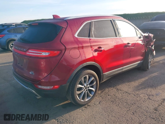 2015 Lincoln MKC with VIN 5LMCJ1A99FUJ09130, listed as a IAAI auction lot 41831811 with 125,804 mi miles. Bid and sale history available at carsss.com. Image 4.