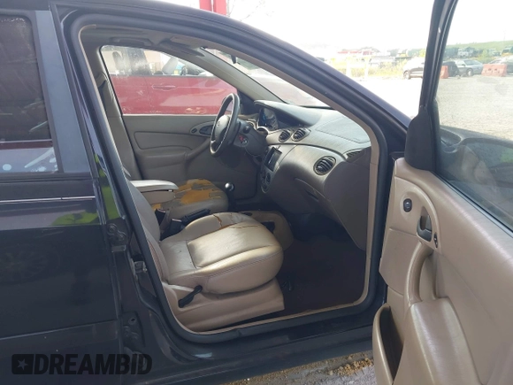 2004 Ford Focus ZTW with VIN 1FAFP35Z64W173237, listed as a IAAI auction lot 42685899 with 209,690 mi miles and . Bid and sale history available at DreamBid. Image 5.