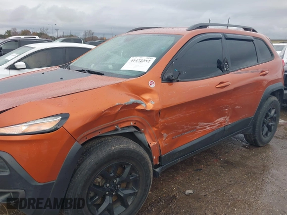 2016 Jeep Cherokee Trailhawk z VIN 1C4PJMBS0GW155379, wystawiony jako IAAI lot #41472352 z przebiegiem 116 036 mil mil oraz . Historia ofert i sprzedaży dostępna na DreamBid. Obrazek 6.