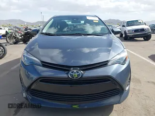 2018 Toyota Corolla L with VIN 5YFBURHEXJP806632, listed as a IAAI auction lot 41933984 with 70,091 mi miles and . Bid and sale history available at DreamBid. Image 13.