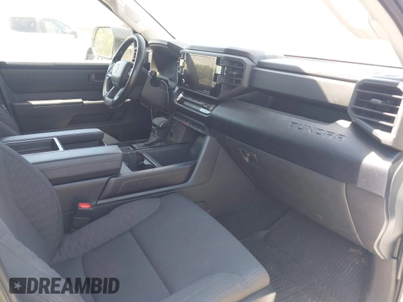 2022 Toyota Tundra with VIN 5TFKB5CDXNX001458, listed as a IAAI auction lot 42640278 with 51,718 mi miles and . Bid and sale history available at DreamBid. Image 5.