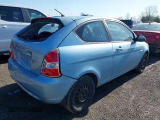 2007 Hyundai Accent SE with VIN KMHCN36CX7U031496, listed as a IAAI auction lot 41811183 with 201,740 mi miles. Bid and sale history available at carsss.com. Image 4.