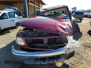 1999 Ford F-150 XL z VIN 1FTRX17L3XNB57415, wystawiony jako Copart lot #88307245 z przebiegiem Nie podano mil oraz Nie do naprawy • Non repairable. Historia ofert i sprzedaży dostępna na DreamBid. Obrazek 5.