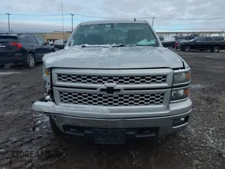 2014 Chevrolet Silverado 1500 LT with VIN 1GCVKREC5EZ115459, listed as a IAAI auction lot 41143910 with 275,008 mi miles and . Bid and sale history available at DreamBid. Image 11.