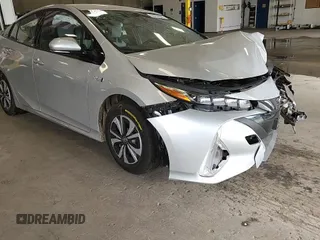 2017 Toyota Prius Plus with VIN JTDKARFP3H3060878, listed as a Copart auction lot 64452005 with 94,367 mi miles and Salvage title. Bid and sale history available at DreamBid. Image 14.