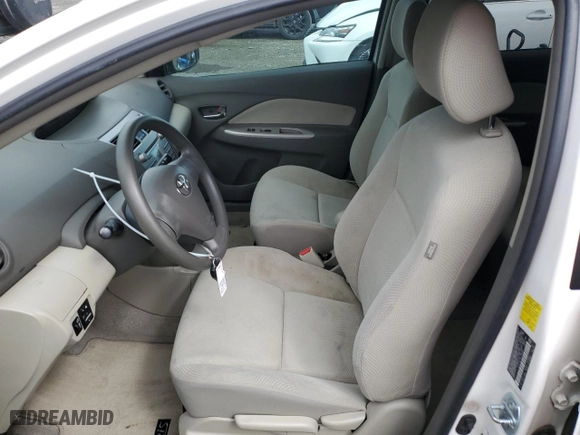2010 Toyota Yaris with VIN JTDBT4K3XA1360659, listed as a Copart auction lot 51490475 with 210,967 mi miles and Salvage Title. Bid and sale history available at carsss.com. Image 7.