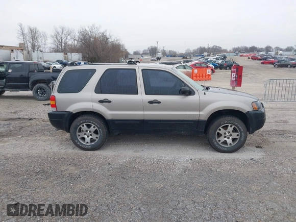 2001 Ford Escape with VIN 1FMUU01B61KE00524, listed as a IAAI auction lot 41486950 with 163,753 mi miles and . Bid and sale history available at DreamBid. Image 13.
