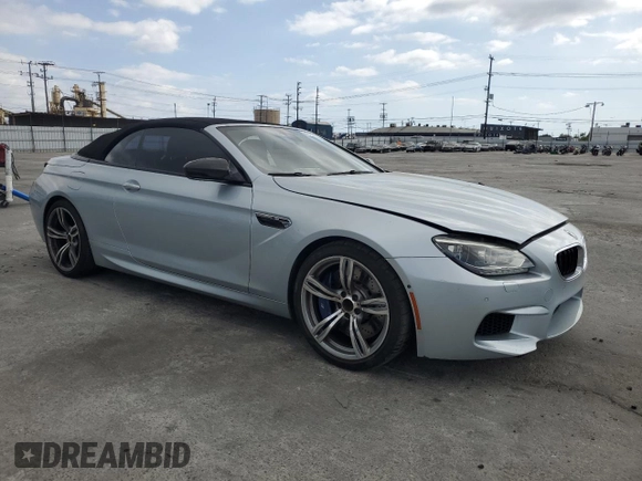 2014 BMW M6 z VIN WBSLZ9C50EDZ78344, wystawiony jako Copart lot #54719265 z przebiegiem 59 556 mil mil oraz Szkoda całkowita • Salvage title. Historia ofert i sprzedaży dostępna na DreamBid. Obrazek 4.