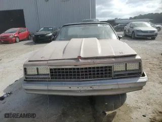1982 Chevrolet El Camino with VIN 1GCCW80HXCR198571, listed as a Copart auction lot 77004474 with 70,899 mi miles and Salvage Title. Bid and sale history available at carsss.com. Image 5.