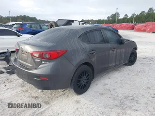 2015 Mazda 3 i SV with VIN JM1BM1T79F1246799, listed as a IAAI auction lot 41785860 with 109,760 mi miles. Bid and sale history available at carsss.com. Image 4.