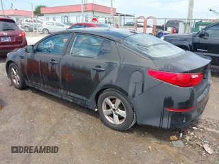 2014 Kia Optima LX with VIN 5XXGM4A73EG322529, listed as a IAAI auction lot 42610691 with 149,546 mi miles and . Bid and sale history available at DreamBid. Image 3.