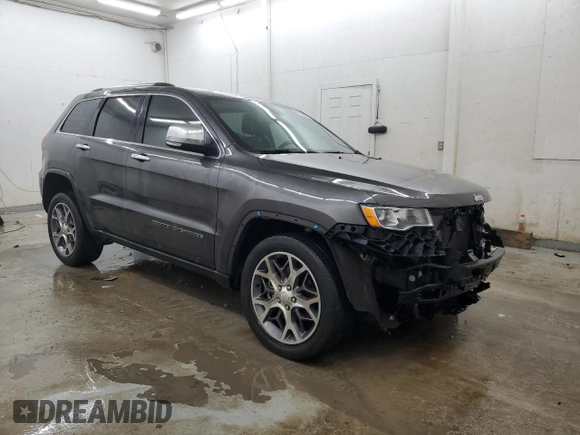 2021 Jeep Grand Cherokee 80th Anniversary with VIN 1C4RJFBG4MC503925, listed as a Copart auction lot 86176384 with 69,765 mi miles and Salvage Title. Bid and sale history available at carsss.com. Image 4.