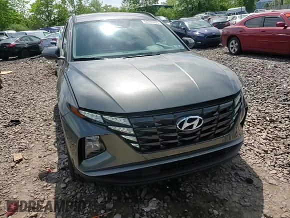 2023 Hyundai Tucson SEL z VIN 5NMJBCAE1PH272772, wystawiony jako Copart lot #56799805 z przebiegiem 20 041 mil mil oraz Szkoda całkowita • Salvage title. Historia ofert i sprzedaży dostępna na DreamBid. Obrazek 13.