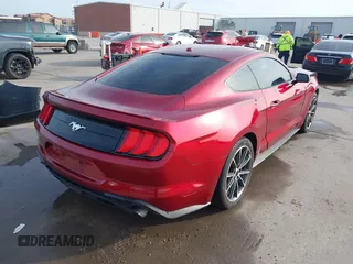 2019 Ford Mustang EcoBoost with VIN 1FA6P8TH2K5162097, listed as a IAAI auction lot 41902511 with 73,306 mi miles and . Bid and sale history available at carsss.com. Image 4.