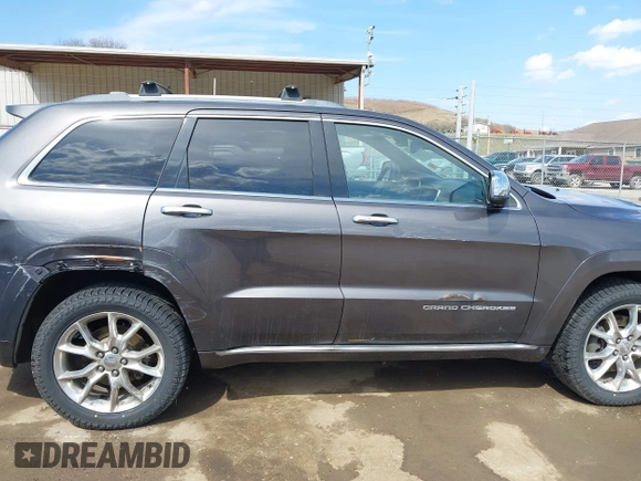2014 Jeep Grand Cherokee Summit with VIN 1C4RJFJM5EC377129, listed as a IAAI auction lot 41763932 with 187,561 mi miles and . Bid and sale history available at DreamBid. Image 6.