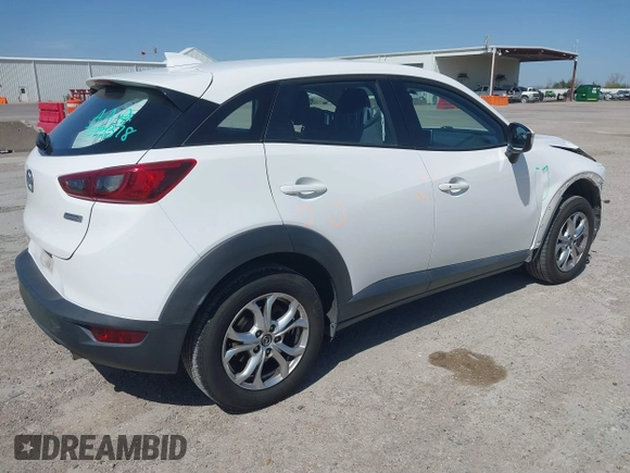 2016 Mazda CX-3 Touring with VIN JM1DKBC71G0126040, listed as a IAAI auction lot 41860285 with 97,986 mi miles and . Bid and sale history available at DreamBid. Image 4.