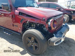 2021 Jeep Gladiator Freedom with VIN 1C6HJTAG2ML549434, listed as a IAAI auction lot 42059434 with 29,041 mi miles and . Bid and sale history available at DreamBid. Image 6.