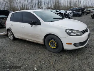 2011 Volkswagen Golf TDI with VIN WVWDM7AJXBW067825, listed as a Copart auction lot 84037684 with 143,121 mi miles and Salvage Title. Bid and sale history available at carsss.com. Image 4.
