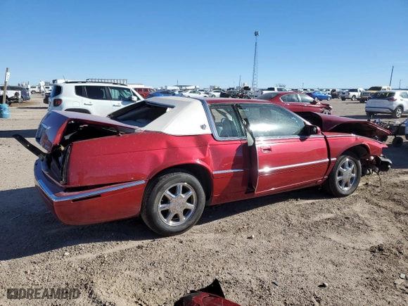 2000 Cadillac Eldorado with VIN 1G6EL12Y2YU147272, listed as a Copart auction lot 84150944 with 0 mi miles and Salvage Title. Bid and sale history available at carsss.com. Image 3.