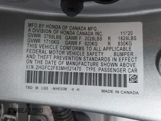 2021 Honda Civic Sport with VIN 2HGFC2F83MH521470, listed as a IAAI auction lot 41828890 with 49,703 mi miles and . Bid and sale history available at DreamBid. Image 9.