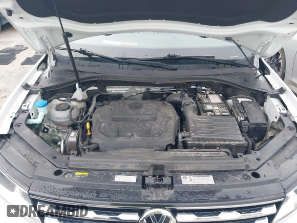 2018 Volkswagen Tiguan S with VIN 3VV1B7AX1JM032250, listed as a IAAI auction lot 42366790 with 65,406 mi miles and . Bid and sale history available at DreamBid. Image 10.