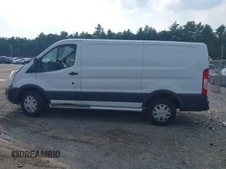 2015 Ford Transit Cargo z VIN 1FTNR1ZM5FKA65799, wystawiony jako IAAI lot #42473586 z przebiegiem 99 756 mil mil oraz . Historia ofert i sprzedaży dostępna na DreamBid. Obrazek 14.