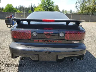 2002 Pontiac Firebird Formula z VIN 2G2FV22G522134431, wystawiony jako Copart lot #56423935 z przebiegiem 46 100 mil mil oraz Szkoda całkowita • Salvage title. Historia ofert i sprzedaży dostępna na DreamBid. Obrazek 6.