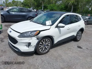2020 Ford Escape Titanium Hybrid with VIN 1FMCU0DZ3LUC07842, listed as a IAAI auction lot 42456359 with 62,756 mi miles and . Bid and sale history available at DreamBid. Image 18.