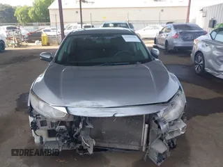 2016 Honda Civic EX with VIN 19XFC2F73GE239657, listed as a IAAI auction lot 42085960 with 136,207 mi miles and . Bid and sale history available at DreamBid. Image 12.
