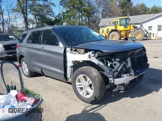 2021 Ford Explorer XLT z VIN 1FMSK8DH4MGA13408, wystawiony jako IAAI lot #41863457 z przebiegiem 76 530 mil mil oraz . Historia ofert i sprzedaży dostępna na DreamBid. Obrazek 1.