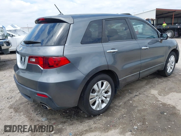 2011 Acura RDX with VIN 5J8TB2H29BA002353, listed as a IAAI auction lot 42220358 with 170,905 mi miles and . Bid and sale history available at DreamBid. Image 4.