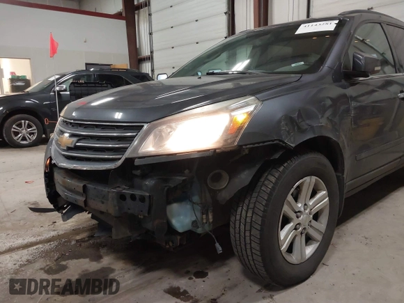 2013 Chevrolet Traverse LT with VIN 1GNKVJKD9DJ152592, listed as a IAAI auction lot 41143281 with 199,259 mi miles and . Bid and sale history available at DreamBid. Image 6.