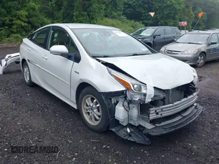 2022 Toyota Prius L Eco z VIN JTDKAMFU2N3167148, wystawiony jako IAAI lot #42534666 z przebiegiem 92 980 mil mil oraz . Historia ofert i sprzedaży dostępna na DreamBid. Obrazek 1.