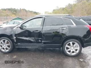 2011 Cadillac SRX Performance Collection with VIN 3GYFNBEYXBS597881, listed as a IAAI auction lot 41016643 with 164,781 mi miles and . Bid and sale history available at carsss.com. Image 14.
