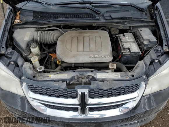 2012 Dodge Grand Caravan SE with VIN 2C4RDGBG4CR335206, listed as a Copart auction lot 52460645 with 191,024 mi miles and Clean Title. Bid and sale history available at DreamBid. Image 12.