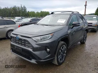 2021 Toyota RAV4 Hybrid XSE with VIN 2T3E6RFV4MW004081, listed as a IAAI auction lot 42300195 with 63,238 mi miles and . Bid and sale history available at DreamBid. Image 2.