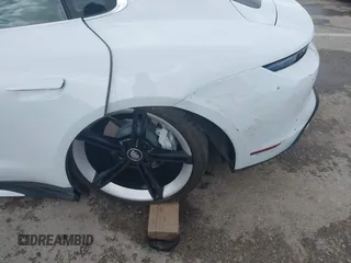 2021 Porsche Taycan Turbo z VIN WP0AC2Y16MSA63752, wystawiony jako IAAI lot #41838152 z przebiegiem 17 304 mil mil oraz . Historia ofert i sprzedaży dostępna na DreamBid. Obrazek 6.