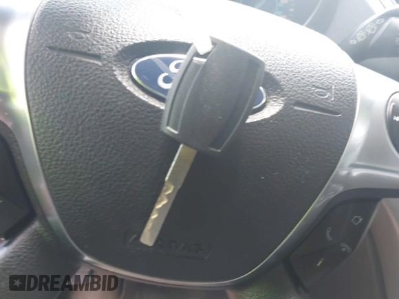 2013 Ford Escape SE with VIN 1FMCU0GX5DUD22065, listed as a IAAI auction lot 42529493 with 134,200 mi miles and . Bid and sale history available at DreamBid. Image 11.