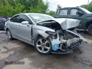 2015 Ford Fusion SE z VIN 3FA6P0H75FR159117, wystawiony jako IAAI lot #42225901 z przebiegiem 168 618 mil mil oraz . Historia ofert i sprzedaży dostępna na DreamBid. Obrazek 1.
