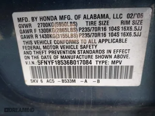 2006 Honda Pilot EX-L with VIN 5FNYF18536B017084, listed as a IAAI auction lot 41899517 with 999,999 mi miles. Bid and sale history available at carsss.com. Image 9.