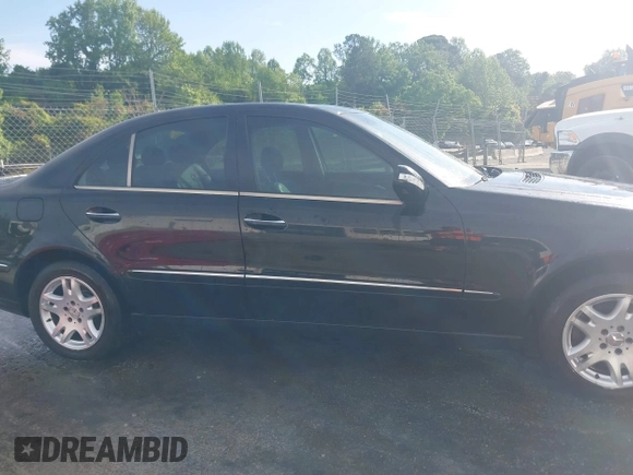 2003 Mercedes-Benz E-Class 3.2L with VIN WDBUF65J93X110625, listed as a IAAI auction lot 41485310 with 164,165 mi miles. Bid and sale history available at carsss.com. Image 13.