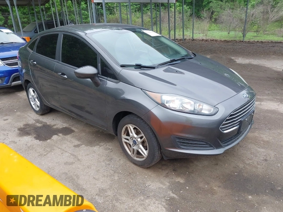 2019 Ford Fiesta SE z VIN 3FADP4BJ7KM155094, wystawiony jako IAAI lot #42186126 z przebiegiem 93 684 mil mil oraz . Historia ofert i sprzedaży dostępna na DreamBid. Obrazek 1.