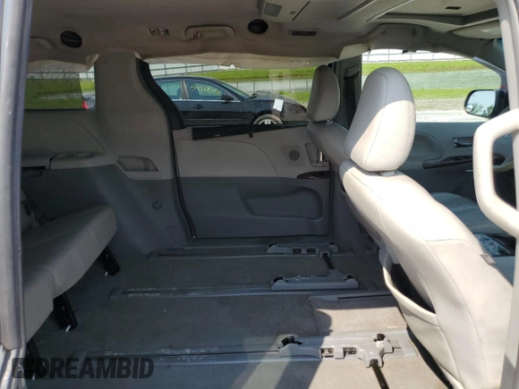2011 Toyota Sienna XLE with VIN 5TDDK3DC4BS004280, listed as a Copart auction lot 59297345 with 173,890 mi miles and Salvage title. Bid and sale history available at DreamBid. Image 11.
