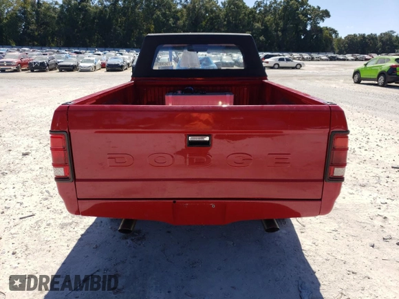 1989 Dodge Dakota z VIN 1B7GG69X9KS181359, wystawiony jako Copart lot #75638874 z przebiegiem 104 095 mil mil oraz Szkoda całkowita • Salvage title. Historia ofert i sprzedaży dostępna na DreamBid. Obrazek 6.