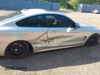 2015 BMW 4 Series 435i xDrive z VIN WBA3R5C51FK372061, wystawiony jako IAAI lot #42546096 z przebiegiem 163 692 mil mil oraz . Historia ofert i sprzedaży dostępna na DreamBid. Obrazek 13.