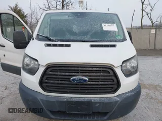 2015 Ford Transit Cargo with VIN 1FTNR1ZM2FKB13159, listed as a IAAI auction lot 41331967 with 152,715 mi miles and . Bid and sale history available at DreamBid. Image 12.