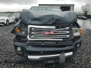 2018 GMC Canyon 4WD SLT z VIN 1GTG6DEN9J1104099, wystawiony jako Copart lot #56195235 z przebiegiem 115 308 mil mil oraz Szkoda całkowita • Salvage title. Historia ofert i sprzedaży dostępna na DreamBid. Obrazek 5.