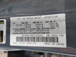 2023 Mazda 3 S Preferred z VIN JM1BPALM9P1623663, wystawiony jako IAAI lot #42341379 z przebiegiem 31 848 mil mil oraz . Historia ofert i sprzedaży dostępna na DreamBid. Obrazek 9.