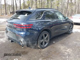 2022 Genesis GV70 Sport z VIN KMUMCDTC3NU074029, wystawiony jako IAAI lot #41400987 z przebiegiem 29 494 mil mil oraz . Historia ofert i sprzedaży dostępna na DreamBid. Obrazek 4.